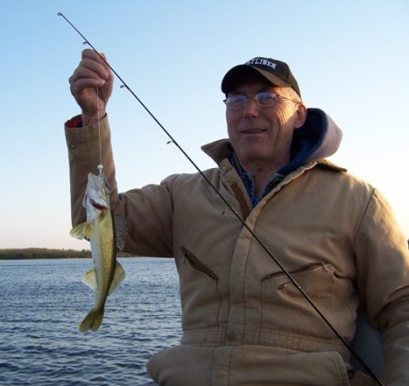 Charlie with a Blackduck walleye