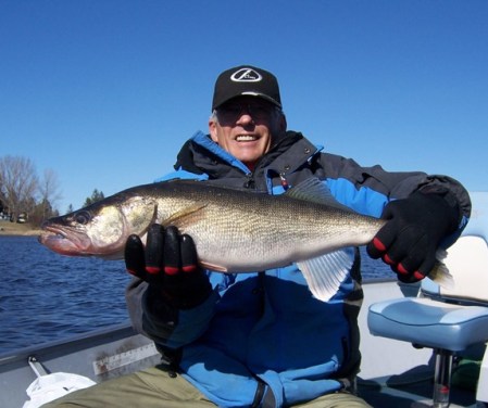 Arvid with 28 inch walleye