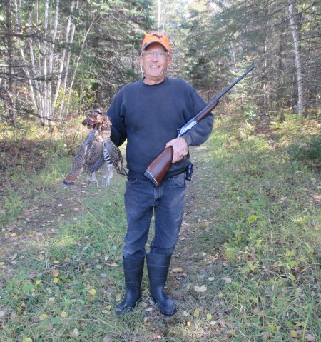 Arvid with 2 ruffed grouse